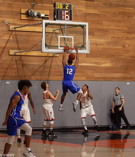 #12 Marcus Harris slams home two points in the first half of the game for the Corsairs.  


Photo Credit: Santiago Barocio